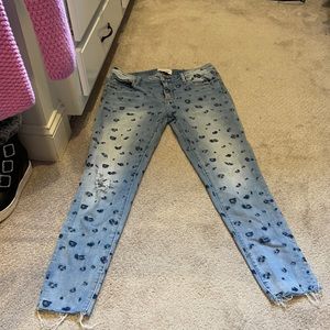 Driftwood size 28 cheetah distressed jeans.